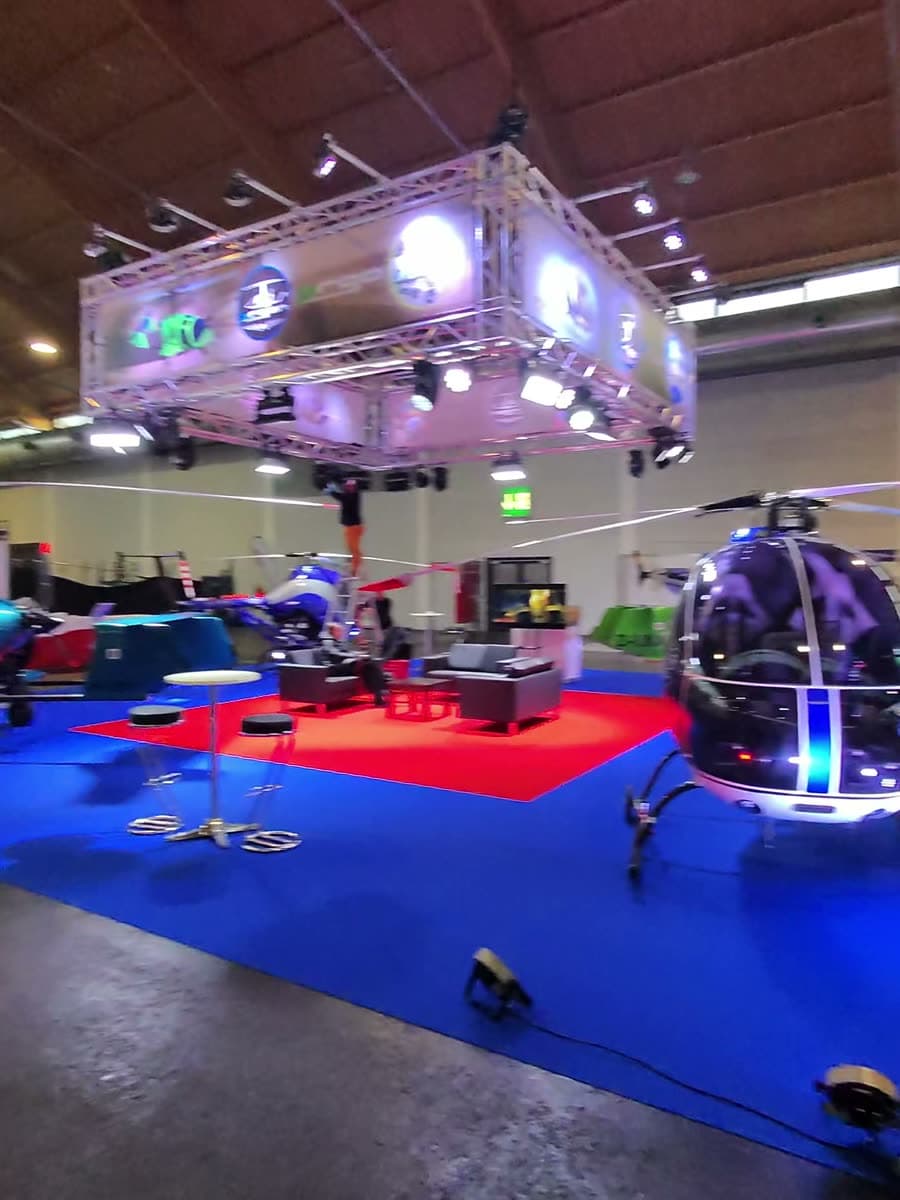 The Manufaktura Lotnicza stand at AERO Friedrichshafen under the lights
